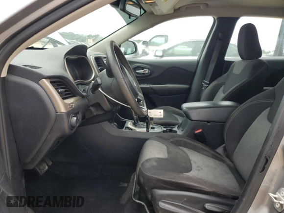 2016 Jeep Cherokee Sport with VIN 1C4PJLAB0GW106601, listed as a Copart auction lot 60854675 with 58,557 mi miles and Salvage title. Bid and sale history available at DreamBid. Image 7.