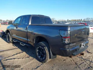 2013 Toyota Tundra 4WD Truck with VIN 5TFUW5F14DX283612, listed as a IAAI auction lot 41551592 with 198,271 mi miles. Bid and sale history available at carsss.com. Image 3.