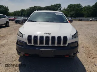 2016 Jeep Cherokee Trailhawk with VIN 1C4PJMBS3GW102000, listed as a Copart auction lot 60866505 with 120,985 mi miles and Salvage title. Bid and sale history available at DreamBid. Image 5.