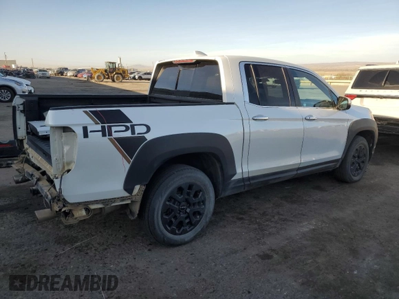 2022 Honda Ridgeline RTL-E with VIN 5FPYK3F77NB031233, listed as a Copart auction lot 49735525 with 71,450 mi miles and Salvage Title. Bid and sale history available at DreamBid. Image 3.