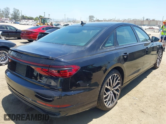 2024 Audi A8 with VIN WAULDAF89RN003075, listed as a IAAI auction lot 42502959 with 4,409 mi miles and . Bid and sale history available at DreamBid. Image 4.