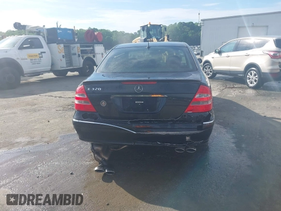 2003 Mercedes-Benz E-Class 3.2L with VIN WDBUF65J93X110625, listed as a IAAI auction lot 41485310 with 164,165 mi miles. Bid and sale history available at carsss.com. Image 16.