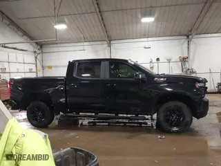 2019 Chevrolet Silverado 1500 LT Trail Boss with VIN 1GCPYFED0KZ399710, listed as a IAAI auction lot 41490011 with 64,716 mi miles. Bid and sale history available at carsss.com. Image 13.