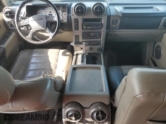 2003 Hummer H2 z VIN 5GRGN23U33H121992, wystawiony jako Copart lot #50388175 z przebiegiem 237 169 mil mil oraz Czysty tytuł • Clean title. Historia ofert i sprzedaży dostępna na DreamBid. Obrazek 8.