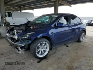 2023 Tesla Model Y Long Range z VIN 7SAYGDEE2PF621443, wystawiony jako Copart lot #46506745 z przebiegiem 37 157 mil mil oraz Szkoda całkowita • Salvage title. Historia ofert i sprzedaży dostępna na DreamBid. Obrazek 1.