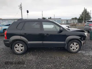 2006 Hyundai Tucson GLS with VIN KM8JN72D66U338658, listed as a IAAI auction lot 41828712 with 198,185 mi miles. Bid and sale history available at carsss.com. Image 14.