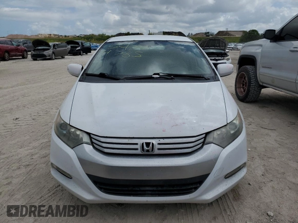 2010 Honda Insight EX with VIN JHMZE2H79AS038112, listed as a Copart auction lot 54794785 with 183,457 mi miles and Salvage Title. Bid and sale history available at DreamBid. Image 5.