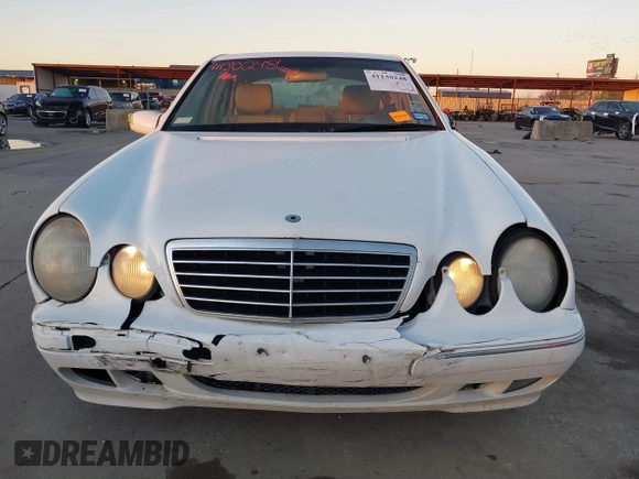 2001 Mercedes-Benz E-Class with VIN WDBJF65J91B249540, listed as a IAAI auction lot 41130248 with 107,582 mi miles. Bid and sale history available at carsss.com. Image 12.