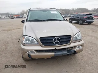 2002 Mercedes-Benz M 320/430/500 z VIN 4JGAB54E82A308902, wystawiony jako IAAI lot #41779482 z przebiegiem 99 933 mil mil oraz . Historia ofert i sprzedaży dostępna na DreamBid. Obrazek 6.