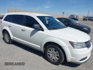 2014 Dodge Journey SE with VIN 3C4PDCAB4ET193896, listed as a IAAI auction lot 42126565 with 242,108 mi miles and . Bid and sale history available at carsss.com. Image 1.