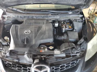 2009 Mazda CX-7 Sport z VIN JM3ER293890236484, wystawiony jako Copart lot #45351555 z przebiegiem 190 497 mil mil oraz Szkoda całkowita • Salvage title. Historia ofert i sprzedaży dostępna na DreamBid. Obrazek 12.