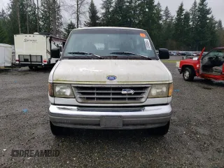 1994 Ford Econoline Wagon XL z VIN 1FBJS31H1RHB32773, wystawiony jako Copart lot #82008864 z przebiegiem Nie podano mil oraz Tytuł czysty. Historia ofert i sprzedaży dostępna na DreamBid. Obrazek 5.