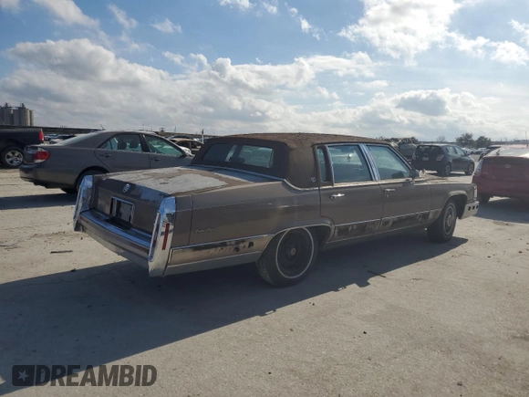 1990 Cadillac Brougham z VIN 1G6DW5476LR727151, wystawiony jako Copart lot #88145665 z przebiegiem Nie podano mil oraz Tytuł czysty. Historia ofert i sprzedaży dostępna na DreamBid. Obrazek 3.