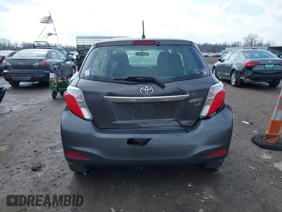 2013 Toyota Yaris L with VIN JTDJTUD30DD568688, listed as a IAAI auction lot 41665697 with 174,007 mi miles. Bid and sale history available at carsss.com. Image 6.
