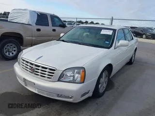 2004 Cadillac DeVille DTS z VIN 1G6KF579X4U238691, wystawiony jako IAAI lot #41367367 z przebiegiem 69 902 mil mil oraz . Historia ofert i sprzedaży dostępna na DreamBid. Obrazek 2.