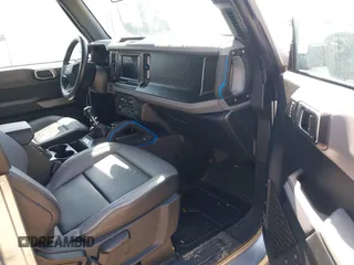 2022 Ford Bronco с VIN 1FMDE5BH3NLA79314, выставлен на аукционе IAAI как лот 42003550 с пробегом 15 303 миль миль и . История ставок и продаж доступна на DreamBid. Изображение 5.