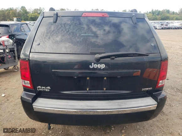 2009 Jeep Grand Cherokee Limited with VIN 1J8HR58T19C548887, listed as a Copart auction lot 73559294 with 97,242 mi miles and Clean Title. Bid and sale history available at carsss.com. Image 6.