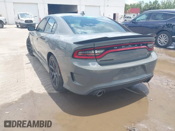 2019 Dodge Charger Scat Pack with VIN 2C3CDXGJ2KH633854, listed as a IAAI auction lot 42212517 with 74,285 mi miles and . Bid and sale history available at DreamBid. Image 3.
