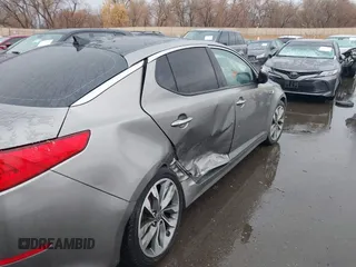 2015 Kia Optima SX Turbo with VIN 5XXGR4A66FG361755, listed as a IAAI auction lot 41199887 with 114,179 mi miles. Bid and sale history available at carsss.com. Image 6.