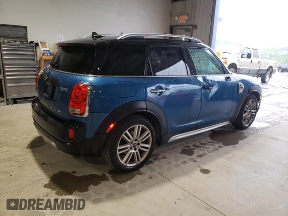 2018 MINI Countryman Cooper с VIN WMZYV5C31J3E04614, выставлен на аукционе Copart как лот 57802375 с пробегом 121 302 миль миль и Списание • Salvage title. История ставок и продаж доступна на DreamBid. Изображение 3.