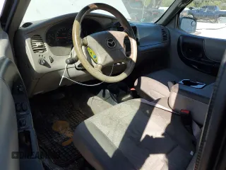 2003 Mazda B-Series 2WD Truck DS with VIN 4F4YR46E13TM02980, listed as a Copart auction lot 81691084 with 179,234 mi miles and Salvage Title. Bid and sale history available at carsss.com. Image 8.