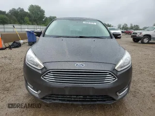 2018 Ford Focus Titanium z VIN 1FADP3N21JL295883, wystawiony jako Copart lot #59051015 z przebiegiem 43 284 mil mil oraz Szkoda całkowita • Salvage title. Historia ofert i sprzedaży dostępna na DreamBid. Obrazek 5.