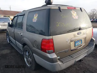 2003 Ford Expedition XLT Value with VIN 1FMPU16W83LA58988, listed as a IAAI auction lot 41627386 with 999,999 mi miles. Bid and sale history available at carsss.com. Image 3.