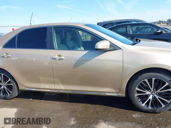 2012 Toyota Camry L z VIN 4T1BF1FK1CU040036, wystawiony jako IAAI lot #42228569 z przebiegiem 220 474 mil mil oraz . Historia ofert i sprzedaży dostępna na DreamBid. Obrazek 13.