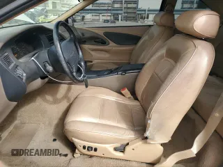1997 Ford Thunderbird LX with VIN 1FALP62W5VH124101, listed as a Copart auction lot 47547695 with 148,828 mi miles and Salvage Title. Bid and sale history available at carsss.com. Image 7.