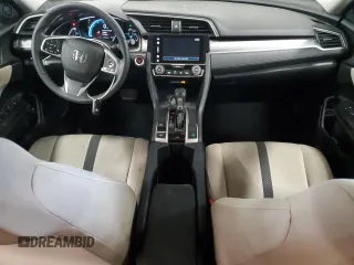 2017 Honda Civic EX z VIN 19XFC2F7XHE003170, wystawiony jako Copart lot #57620105 z przebiegiem 231 942 mil mil oraz Szkoda całkowita • Salvage title. Historia ofert i sprzedaży dostępna na DreamBid. Obrazek 8.