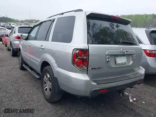 2006 Honda Pilot EX-L with RES with VIN 5FNYF286X6B043597, listed as a IAAI auction lot 41940460 with 325,118 mi miles. Bid and sale history available at carsss.com. Image 3.