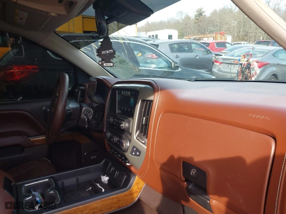 2015 Chevrolet Silverado 1500 High Country with VIN 3GCUKTEC3FG506216, listed as a IAAI auction lot 41672433 with 77,653 mi miles. Bid and sale history available at carsss.com. Image 5.