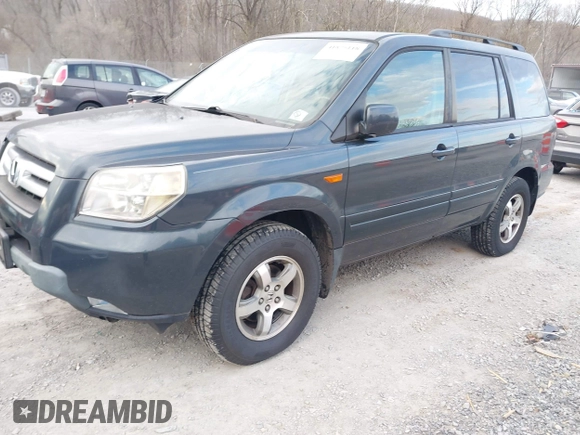 2006 Honda Pilot EX-L with VIN 2HKYF18746H558986, listed as a IAAI auction lot 41875118 with 207,058 mi miles and . Bid and sale history available at DreamBid. Image 2.