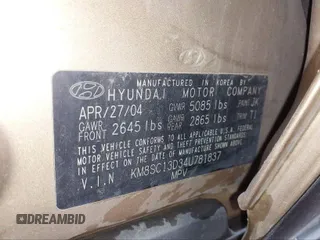 2004 Hyundai Santa Fe GLS with VIN KM8SC13D34U781837, listed as a IAAI auction lot 40452732 with 223,991 mi miles. Bid and sale history available at carsss.com. Image 9.