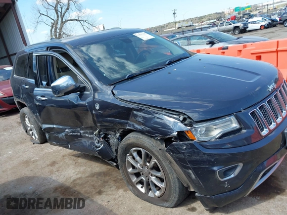 2015 Jeep Grand Cherokee Overland with VIN 1C4RJFCG6FC831641, listed as a IAAI auction lot 41877680 with 143,568 mi miles. Bid and sale history available at carsss.com. Image 13.
