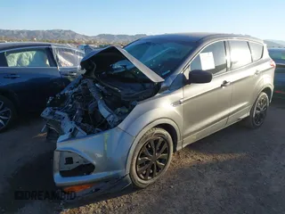 2014 Ford Escape S with VIN 1FMCU0F75EUD01705, listed as a IAAI auction lot 41504849 with 136,353 mi miles. Bid and sale history available at carsss.com. Image 2.