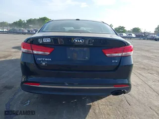 2016 Kia Optima EX with VIN 5XXGU4L3XGG033323, listed as a IAAI auction lot 42088998 with 134,686 mi miles. Bid and sale history available at carsss.com. Image 16.