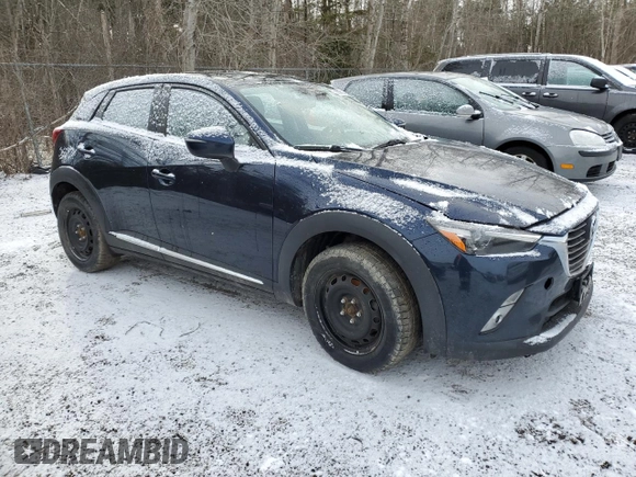 2018 Mazda CX-3 Grand Touring z VIN JM1DKFD73J0309811, wystawiony jako Copart lot #50003315 z przebiegiem 135 365 mil mil oraz Czysty tytuł • Clean title. Historia ofert i sprzedaży dostępna na DreamBid. Obrazek 4.