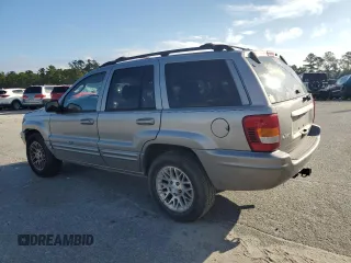 2002 Jeep Grand Cherokee Limited with VIN 1J4GX58S32C149852, listed as a Copart auction lot 71655864 with 190,918 mi miles and Salvage Title. Bid and sale history available at DreamBid. Image 2.