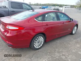 2013 Ford Fusion SE Hybrid with VIN 3FA6P0LU6DR302909, listed as a IAAI auction lot 42035803 with 186,050 mi miles. Bid and sale history available at carsss.com. Image 4.