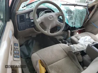 2003 Toyota Tacoma PreRunner z VIN 5TEGN92N03Z232888, wystawiony jako Copart lot #56922295 z przebiegiem 281 137 mil mil oraz Szkoda całkowita • Salvage title. Historia ofert i sprzedaży dostępna na DreamBid. Obrazek 8.
