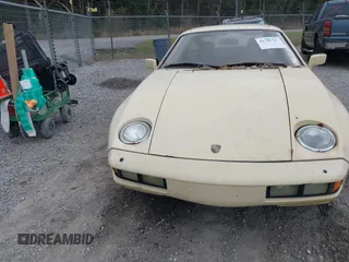 1982 Porsche 928 z VIN WP0JA0921CS820795, wystawiony jako IAAI lot #41741787 z przebiegiem 121 568 mil mil oraz . Historia ofert i sprzedaży dostępna na DreamBid. Obrazek 12.