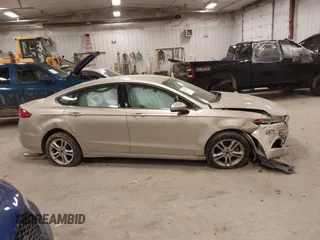 2018 Ford Fusion SE z VIN 3FA6P0HD2JR201693, wystawiony jako IAAI lot #42012709 z przebiegiem 110 857 mil mil oraz . Historia ofert i sprzedaży dostępna na DreamBid. Obrazek 13.
