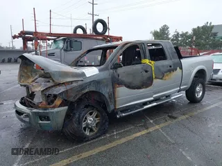 2013 Ram 2500 Laramie with VIN 3C6TR5NT1DG551369, listed as a IAAI auction lot 41561187 with Not Provided miles. Bid and sale history available at carsss.com. Image 2.
