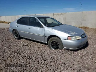 2001 Nissan Altima GXE with VIN 1N4DL01DX1C114569, listed as a Copart auction lot 58222534 with 145,798 mi miles and Salvage Title. Bid and sale history available at carsss.com. Image 4.