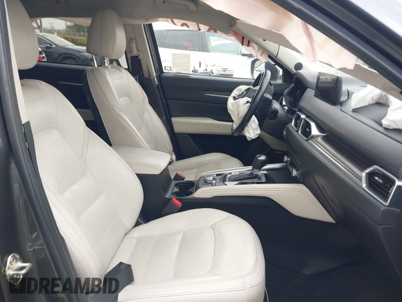 2022 Mazda CX-5 2.5 S Premium Plus Package with VIN JM3KFBEM1N0523105, listed as a IAAI auction lot 41730897 with 64,008 mi miles. Bid and sale history available at carsss.com. Image 5.
