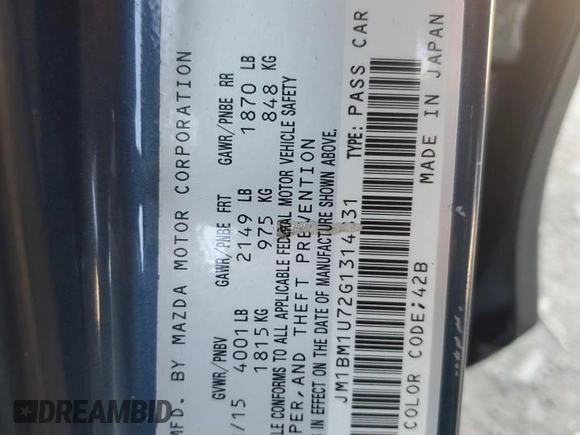 2016 Mazda 3 i Sport with VIN JM1BM1U72G1314831, listed as a Copart auction lot 53590235 with 100,547 mi miles and Salvage Title. Bid and sale history available at DreamBid. Image 13.