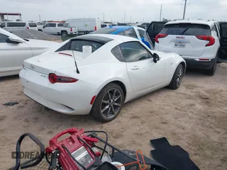 2021 Mazda MX-5 Miata Grand Touring with VIN JM1NDAM71M0454514, listed as a IAAI auction lot 41940252 with Not provided miles and . Bid and sale history available at DreamBid. Image 4.