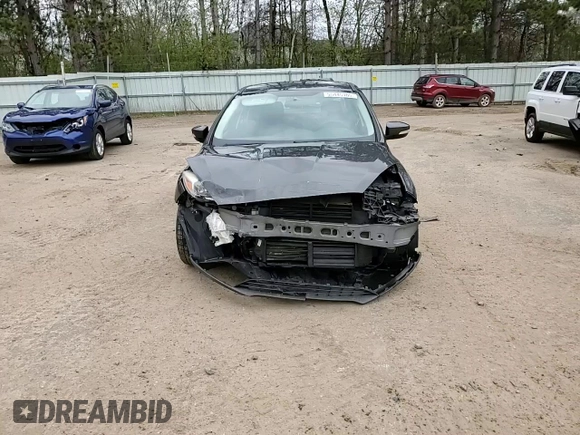 2016 Ford Focus SE z VIN 1FADP3F20GL305441, wystawiony jako Copart lot #55445105 z przebiegiem 117 033 mil mil oraz Szkoda całkowita • Salvage title. Historia ofert i sprzedaży dostępna na DreamBid. Obrazek 14.