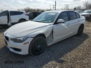2013 BMW 3 Series 320i xDrive with VIN WBA3C3C5XDF980169, listed as a Copart auction lot 52717675 with 119,297 mi miles and Salvage title. Bid and sale history available at DreamBid. Image 1.